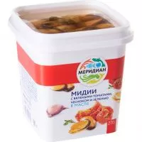 Фото акции МЕРИДИАН Мясо мидий чилийских в масле с вяленым томатом, чесноком и зеленью 270г