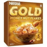 Фото акции NEST.Хлопья GOLD кукур.мед/арахис300г